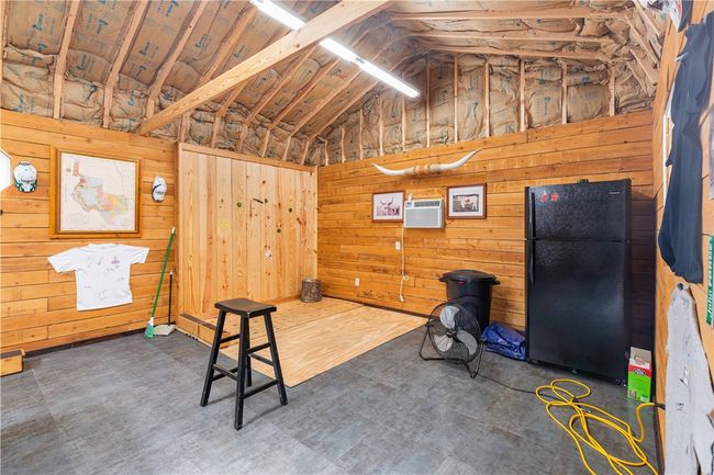 28x16 party barn, heated & cooled with laminate flooring and wood accent walls | Image 15