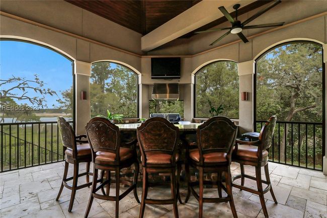 Covered lanai- outdoor kitchen & bar | Image 56