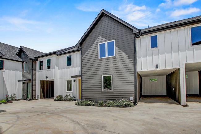View of front of home with board and batten siding and roof with shingles | Image 28