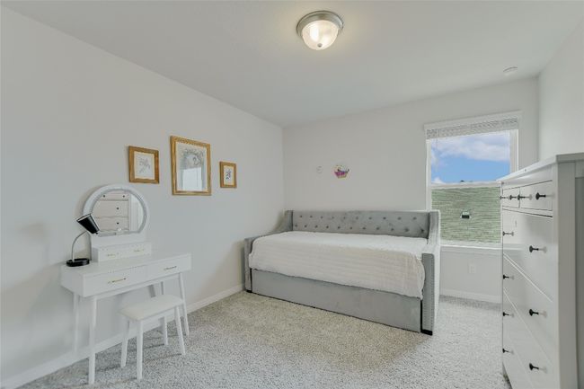 Bedroom with and carpet | Image 24