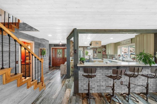 This digitally altered image showcases multiple design possibilities for a single space. The photo has been enhanced to illustrate variations in wall colors and lighting styles. Allowing viewers to visualize how the same room can be transformed through different design choices. | Image 10