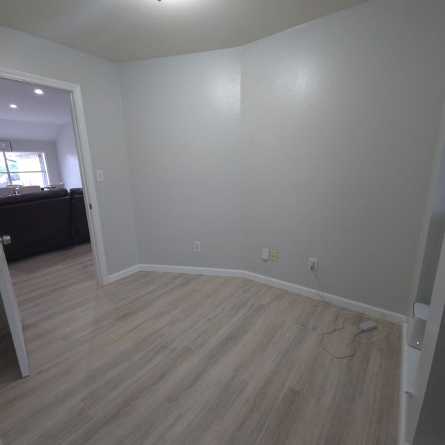 Bedroom 6, Small bedroom or office. light wood finished floors and recessed lighting | Image 29
