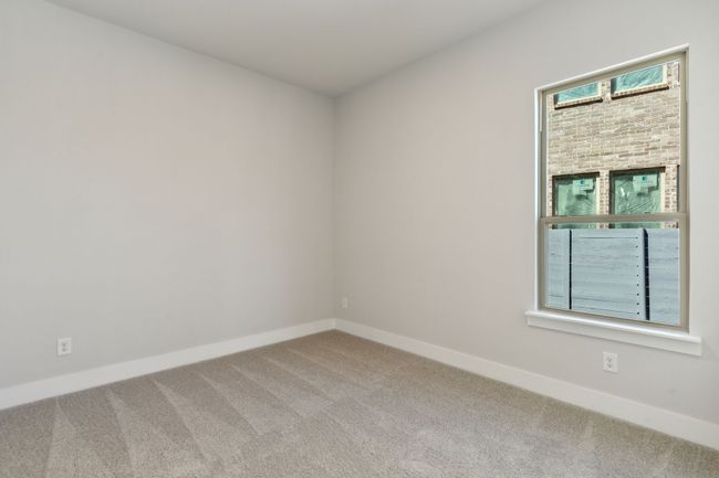 Carpeted empty room with baseboards | Image 27
