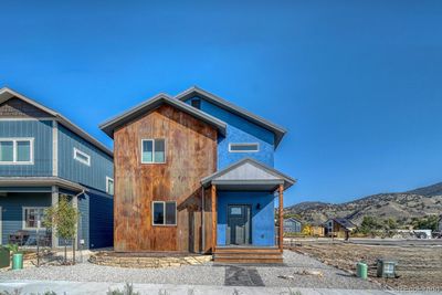 This south facing home captures sunlight and mountain views | Image 2