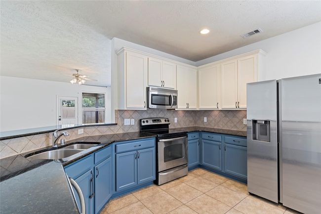 23307 W Pine Ivy Ln, House other with 4 bedrooms, 2 bathrooms and 2 parking in Tomball TX | Image 9