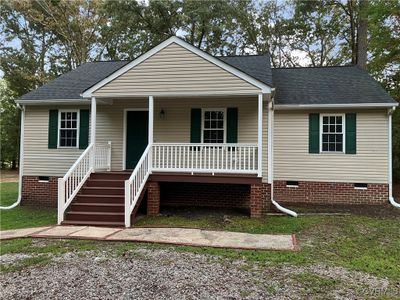 View of front of house featuring covered porch | Image 1