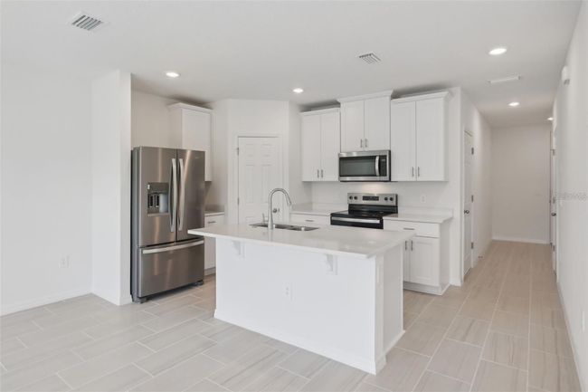 16403 Bird Of Paradise Ave, Townhouse with 3 bedrooms, 3 bathrooms and null parking in CLERMONT FL | Image 10