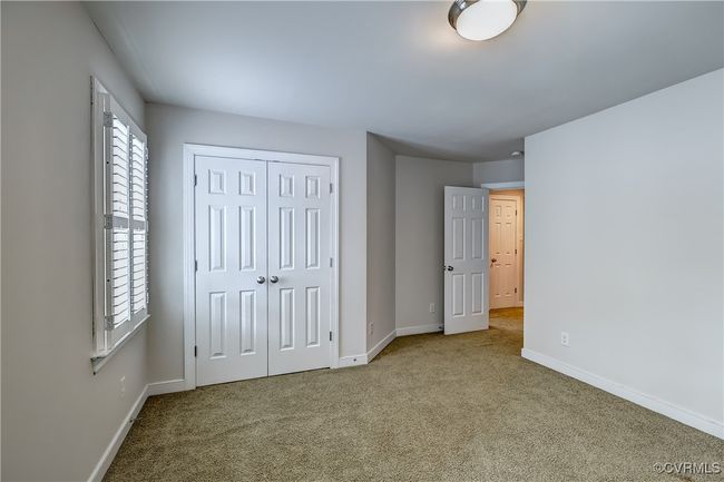 Carpeting & ample closet space. | Image 24