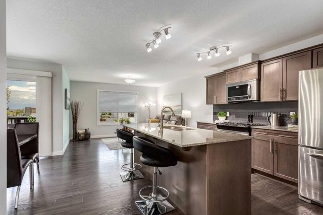 251 Kingsbridge Rd Se, Home with 2 bedrooms, 3 bathrooms and 2 parking in Airdrie AB | Image 8