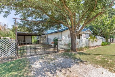 View of gate with a yard | Image 1