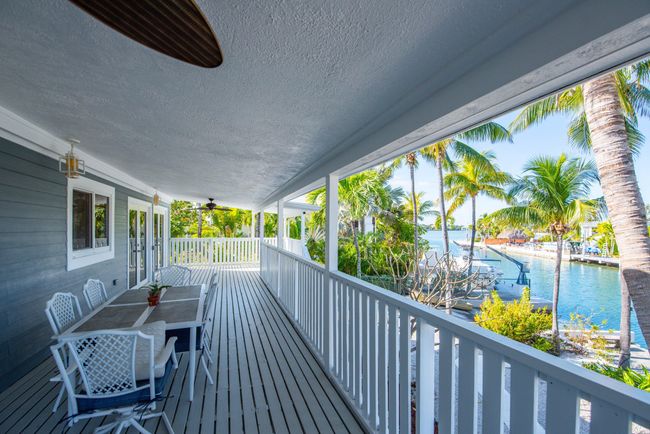 Large covered back deck | Image 11