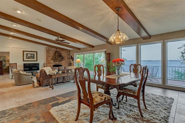 Bright and airy, the open-concept design enhances the sense of space and connection throughout the main living areas. | Image 13