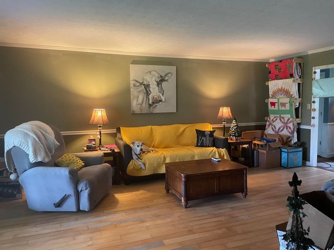 Living area featuring ornamental molding and wood-type flooring | Image 5