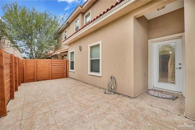 Fenced backyard featuring a patio | Image 17