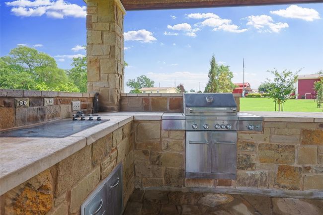 View of patio with grilling area and area for grilling | Image 23