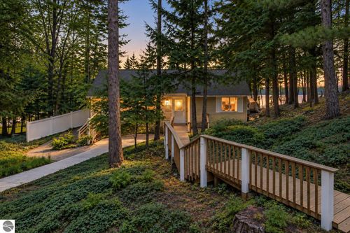 687 Arbutus Trl, Traverse City, MI, 49696-9407 | Card Image