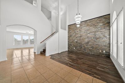 Soaring high ceilings in front foyer with a fresh coat of paint! | Image 2