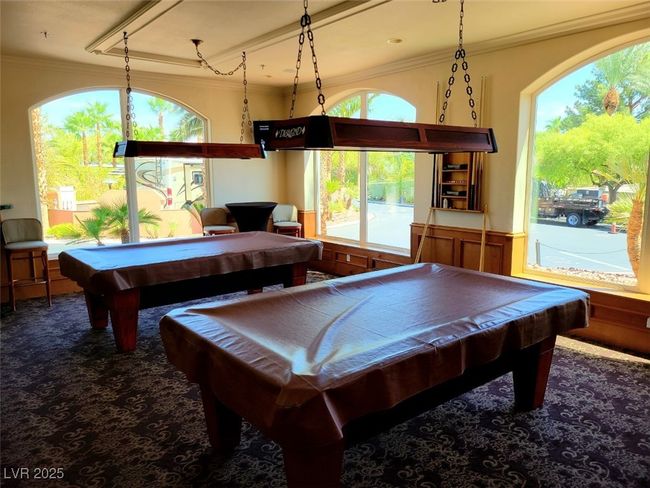 Playroom with carpet floors, billiards, and ornamental molding | Image 14