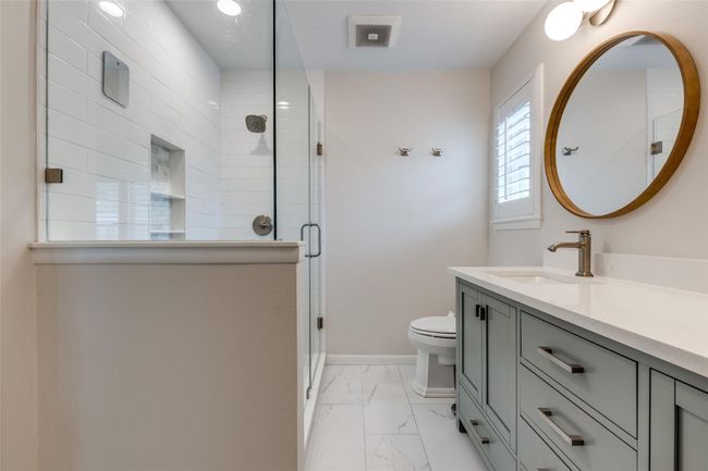 Partial view of primary bathroom. | Image 17
