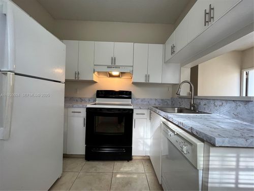 c21-671 Cypress Lake Blvd, Deerfield Beach, FL, 33064-5091 | Card Image