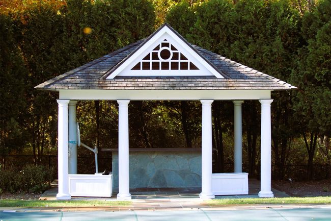 View of outbuilding featuring an outdoor pool and a gazebo | Image 32