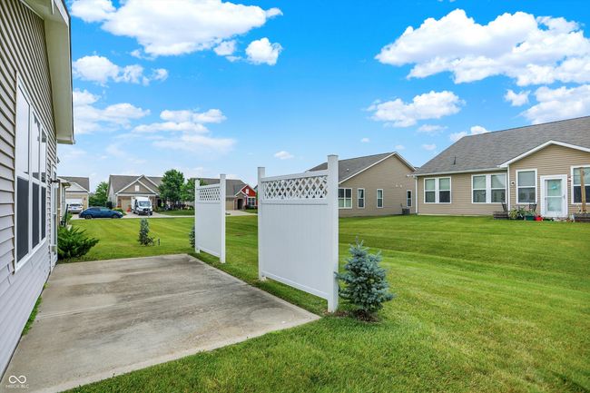 view of grassy yard with a residential view | Image 17