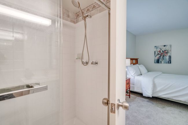 Primary Bath Into bedroom | Image 22