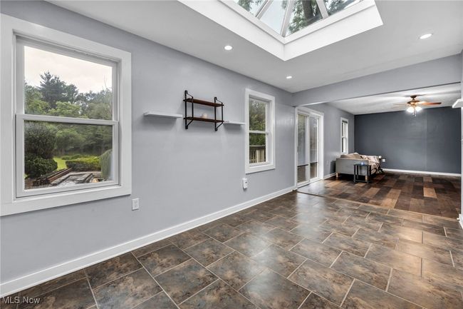 Light filled atrium with access to primary bedroom and rec room | Image 14