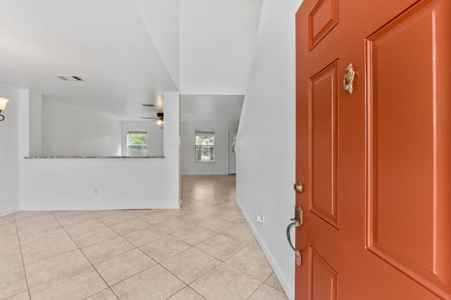 light tile patterned floors, and baseboards | Image 5