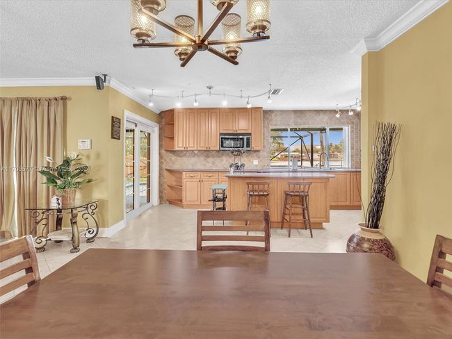 8910 Nw 7 Th Ct, House other with 3 bedrooms, 2 bathrooms and null parking in Pembroke Pines FL | Image 12