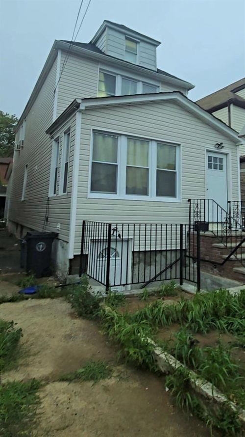 2420 Gillmore St, East Elmhurst, NY, 11369-1610 | Card Image