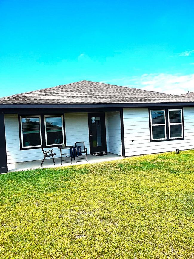Backyard with a cover porch. | Image 24