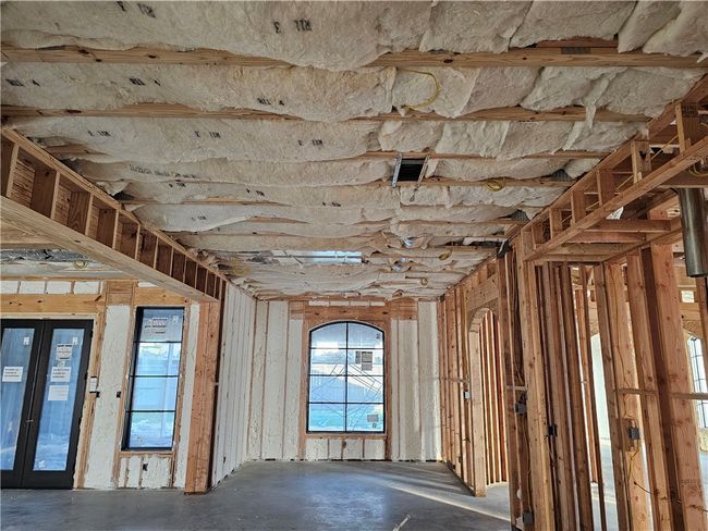 Miscellaneous room featuring plenty of natural light and concrete flooring | Image 20