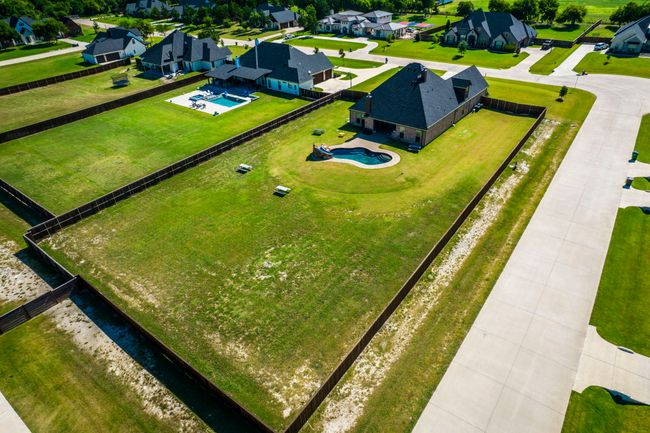 Aerial view of residential area featuring a pool | Image 30