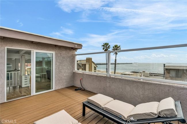 A large deck off the loft is great for entertaining and relaxing with wide open views of the bay and ocean | Image 20