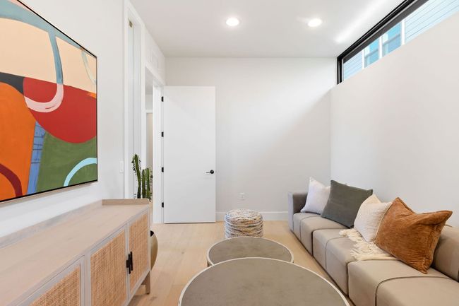 Living room featuring recessed lighting, baseboards, and light wood-style floors | Image 10