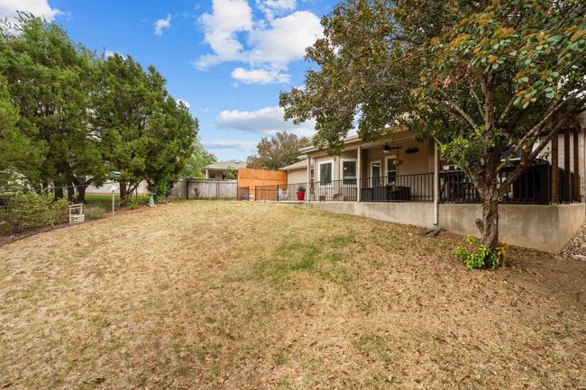 View of yard featuring fence and ceiling fan | Image 11