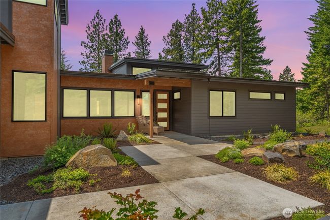 This home showcases incredible architecture with striking contemporary finishes and thoughtfully curated designer lighting | Image 36