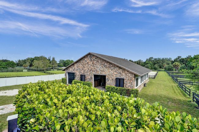 502 Rambling Drive Cir, House other with 5 bedrooms, 3 bathrooms and null parking in Wellington FL | Image 33