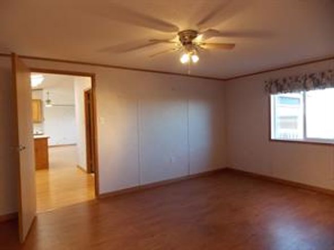 77 - 5210 65 Ave, Home with 3 bedrooms, 2 bathrooms and 3 parking in Olds AB | Image 18