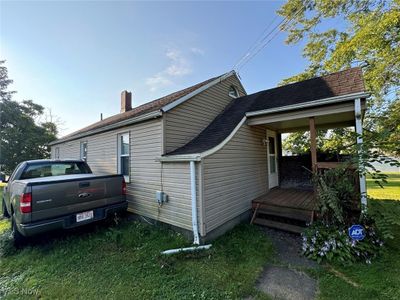 View of home's exterior featuring a yard | Image 2