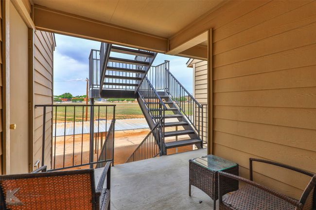 Back Stairs leading to covered parking | Image 31