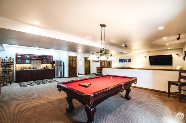 Pool and wet bar are inviting for your friends and family to get together | Image 24