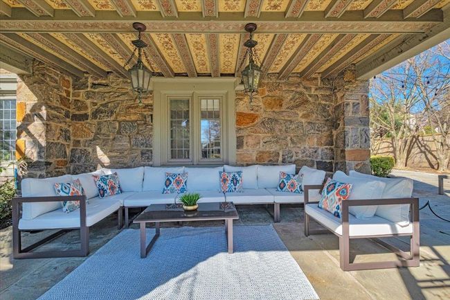 View of patio with outdoor lounge area. | Image 28