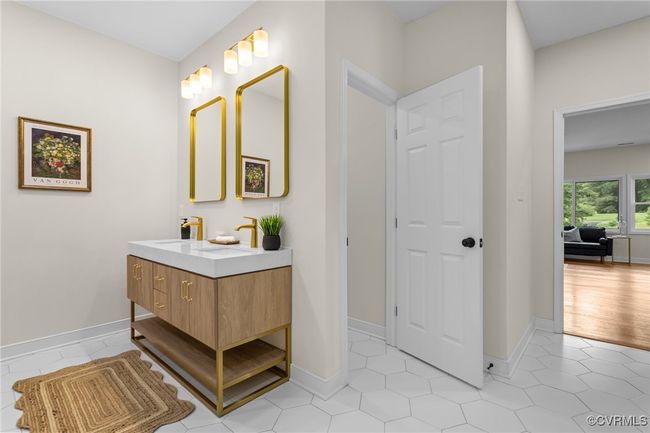 Bathroom featuring vanity and tile patterned flooring | Image 38