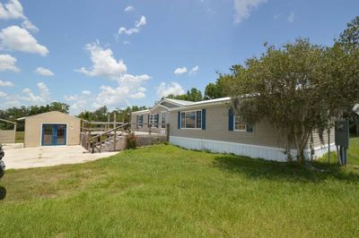 15395 Nw 112th Place Road, Home with 3 bedrooms, 2 bathrooms and null parking in Morriston FL | Image 1