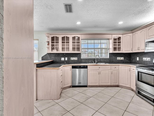 8970 Johnson St, House other with 3 bedrooms, 2 bathrooms and null parking in Pembroke Pines FL | Image 33
