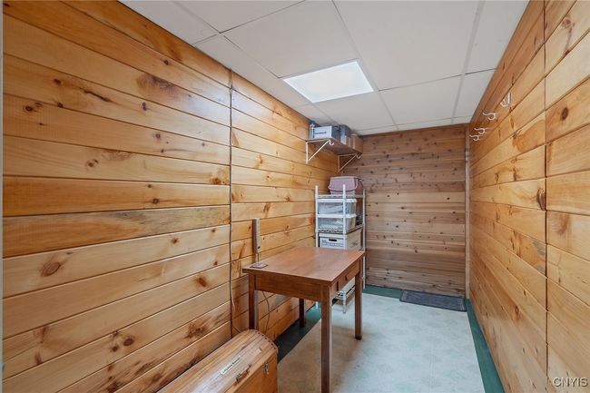 Basement bonus room with a cedar wall | Image 34