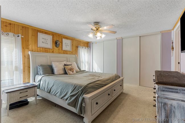 Accent wall updates this cute primary bedroom | Image 26