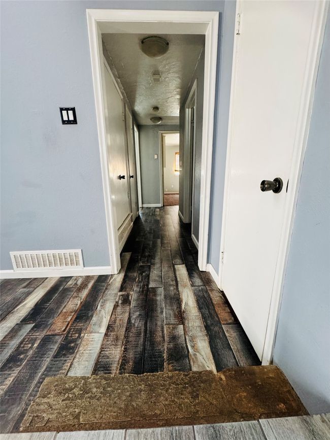 Hallway featuring dark hardwood / wood-style flooring | Image 13